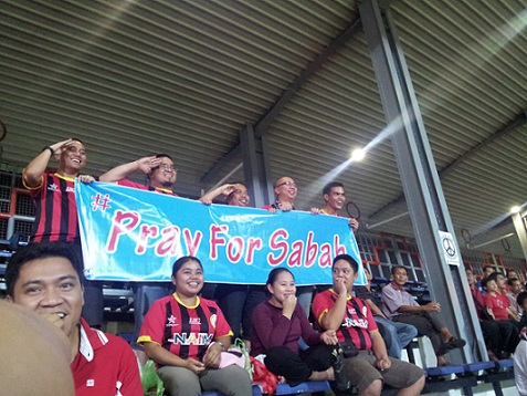 Among the few banners at the Sarawak State Stadium
